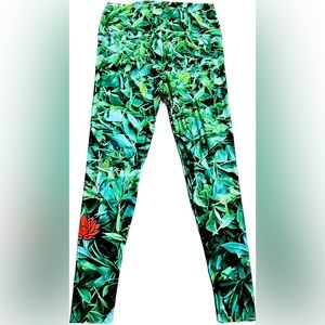 Statement Leggings green Leaf print with Bright orange lotus on the calf